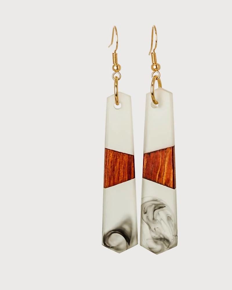 Front of a size O/S Lily Earrings in Black in Black by Wooden Element. | dia_product_style_image_id:329350
